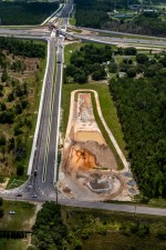 Looking east at Overpass Road widening and pond construction from Old Pasco Road to east of I-75 (6/17/2022 photo)