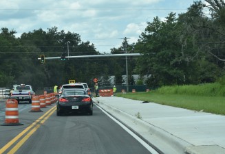 Looking west on Overpass Road at the new traffic signals at Old Pasco Road (8/15/2022 photo)