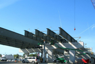 Day work on bridge girders that were installed at night over Ulmerton Road (March 2020 photo)