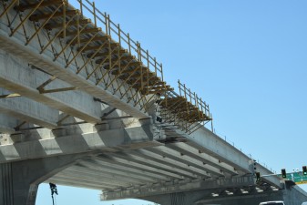 Toll SR 690 bridge construction in the median of 118th Avenue N near 49th Street N (3-22-2023 photo)