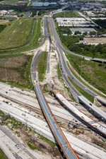 Looking west over I-275 at construction of ramp connections to 118th Ave. N. and SR 690 (7-14-2023 photo)