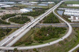 Looking northwest over I-275 at the Gandy Blvd. interchange and express lane widening in the I-275 median (12-13-2023 photo)