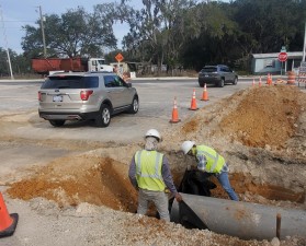 Installing concrete drainage pipe at Cove Lane (1/25/2023 photo)