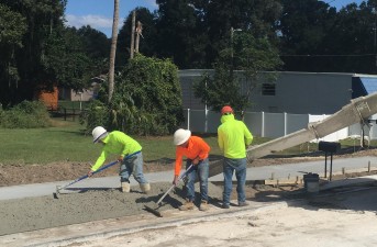 Placing concrete for driveway by Orangewood Drive (10/19/2021 photo)