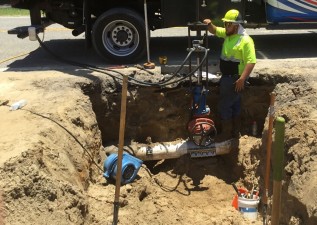 Working on a water line along Clinton Avenue (July 10, 2021 photo)