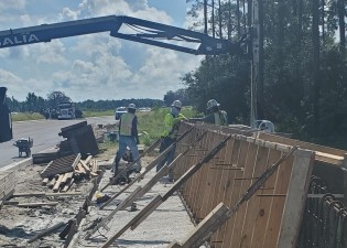 Barrier wall construction at Bayou Branch (8/10/2021 photo)