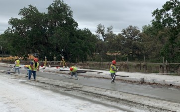 Finishing concrete for turn lane at Prospect Road (April 1, 2021 photo)