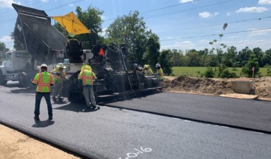 Placing second layer of asphalt base (April 7, 2021 photo)