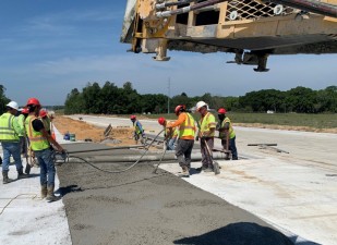 Placing concrete for turn lane (April 9, 2021 photo)