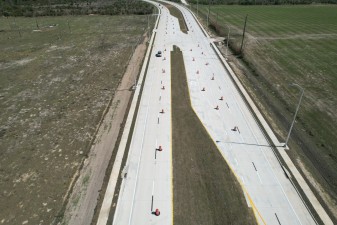 Looking east over the new alignment of SR 52 approaching Prospect Road (2/20/2023 photo)