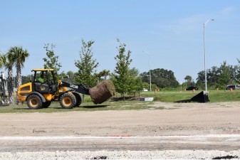 Transporting sod to be placed along the connecting road between CR 52 (old SR 52) and new SR 52 (5-4-2023 photo)