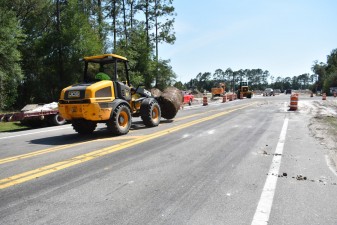 Transporting sod to be placed along the connecting road between CR 52 (old SR 52) and new SR 52 (5-4-2023 photo)