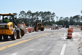 Workers are busy completing work on the connecting road between CR 52 (old SR 52) and new SR 52 (5-4-2023 photo)