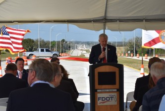 FDOT Secretary David Gwynn, P.E. talks about the benefits of the project at a new alignment opening day event (2/17/2023 photo)