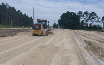 Installing first layer of the roadway base for new westbound SR 52 near Smith Road (5/26/2022 photo)