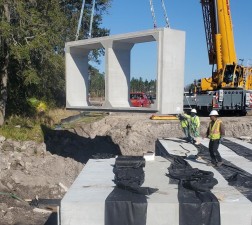 Setting a precast section of box culvert at Bayou Branch (2/9/2022 photo)