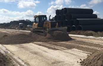 Base material installation for the new SR 52 roadway (May 2021 photo)
