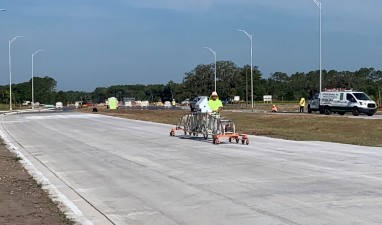 Measuring the surface regularity of the new SR 52 roadway to ensure it is built to specifications (May 2021 photo)