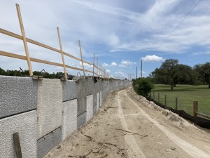Wall construction on the south side of SR 50 for the higher elevation roadway between US 301 and the railroad (4-28-2023 photo)