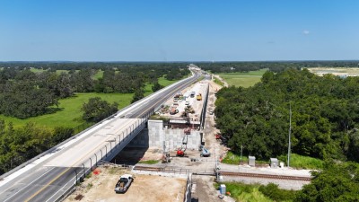 Looking west at construction of a new bridge for westbound SR 50 traffic (7-28-2025 photo)