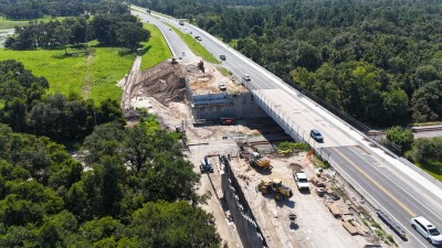 Looking east at construction of a new bridge for westbound SR 50 traffic (7-28-2025 photo)