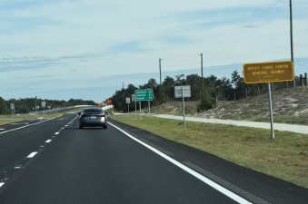 Looking east at new pavement and all lanes open on SR 50 approaching the bridge over the railroad tracks (12-9-2025 photo)