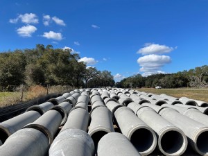 Stockpile of concrete drainage pipe that will be installed (1/13/2022 photo)