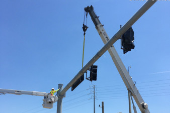 Installing a mast arm for traffic signals and signs along SR 54 (May 8, 2020 photo)