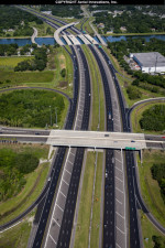 Looking east towards the US 301 interchange and the Tampa Bypass Canal near the top of the photo, you can see the I-4 repaving is nearing completion as shown by the dark pavement (May 7, 2020 photo)