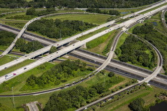Looking northwest at the I-75 interchange, the I-4 repaving is almost complete as shown by the dark pavement on the lower roadway (August 10, 2020 photo)