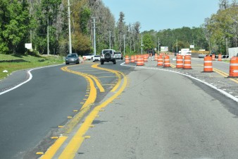 Looking north on US 98 at traffic shifted onto temporary pavement at Big Cypress Boulevard (3-14-2025 photo)