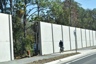 A shared use path and noise barrier have been constructed on the east side of US 98 (2-5-2026 photo)