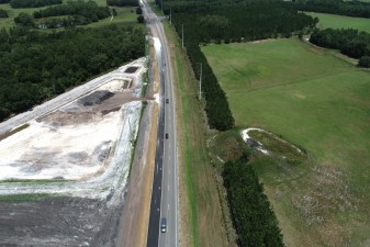 Looking northwest at storm water pond construction on the west side of the US 98 corridor, just south of SR 471 (6-10-2024 photo)
