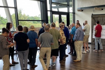 Visitors talk with project team members and view project plans during a public open house for the project (9/10/2024 photo)