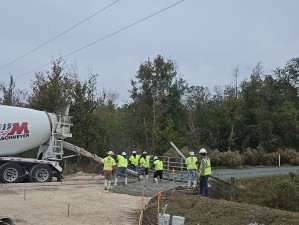 Placing concrete for a driveway (12-10-2025 photo)
