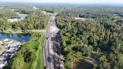 Looking northwest over US 98 at Big Cypress Boulevard where a roundabout will be built (8-29-2025 photo)