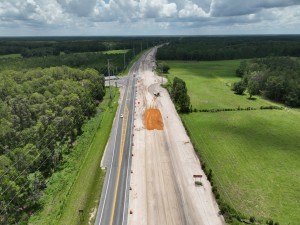 Looking southeast over US 98 at roundabout construction at SR 471 (6-29-2026 photo)