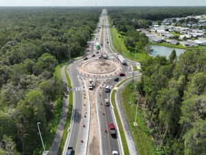 Looking southeast over US 98 at the roundabout at Big Cypress Blvd. (7-31-2026 photo)