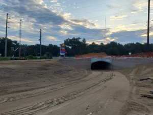 Grading nearing completion on the west side of the underpass (August 2021 photo)
