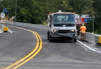 Preparing a temporary roadway to shift US 41 east of the existing alignment (5/10/2021 photo)