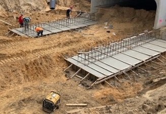 Finishing the concrete footers for the remaining segments (9/8/2021 photo)
