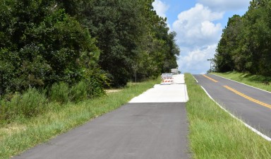 New asphalt and concrete trail along Delmane Drive (7/22/2021 photo)