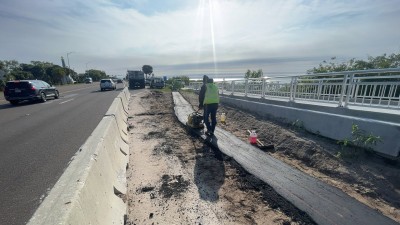 Crews prepare for placement of guardrail (March 2026 photo)