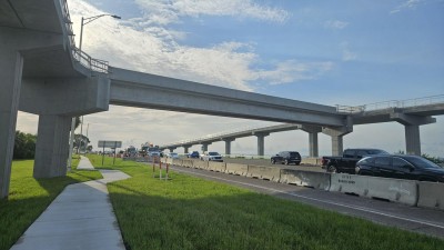 Looking east at the pedestrian bridge over SR 60 (July 2026 photo)