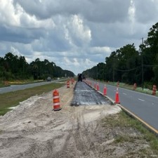 Paving new turn lanes (8/3/2022 photo)