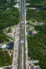 Looking northwest over US 19 at sidewalk and trail construction from south of W. Cyprian Ct. to W. Green Acres Street (9/7/2022 photo)