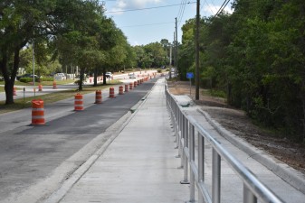 New sidewalk and handrail along an inclined section of N. Forest Ridge Blvd. (5/17/2022 photo)