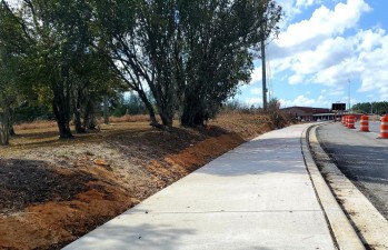 Looking south at new sidewalk along Forest Ridge Blvd. north of Forest Ridge Elementary School (2/16/2022 photo)