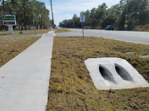 New sidewalk, drainage, and crosswalk along Pleasant Grove Road (February 4, 2021 photo)
