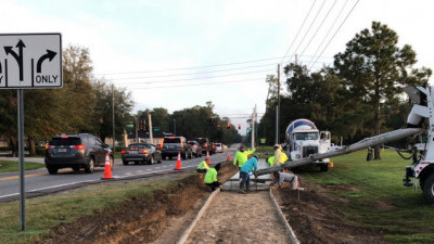 Pouring concrete for a new sidewalk (October 9, 2020 photo)